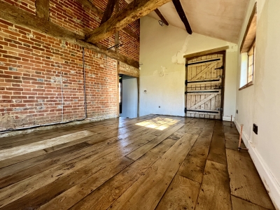 Reclaimed wooden floor Reclaimed elm floor after fitting and finishing